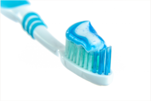 Close up of toothbrush with toothpaste Dentist in Tacoma